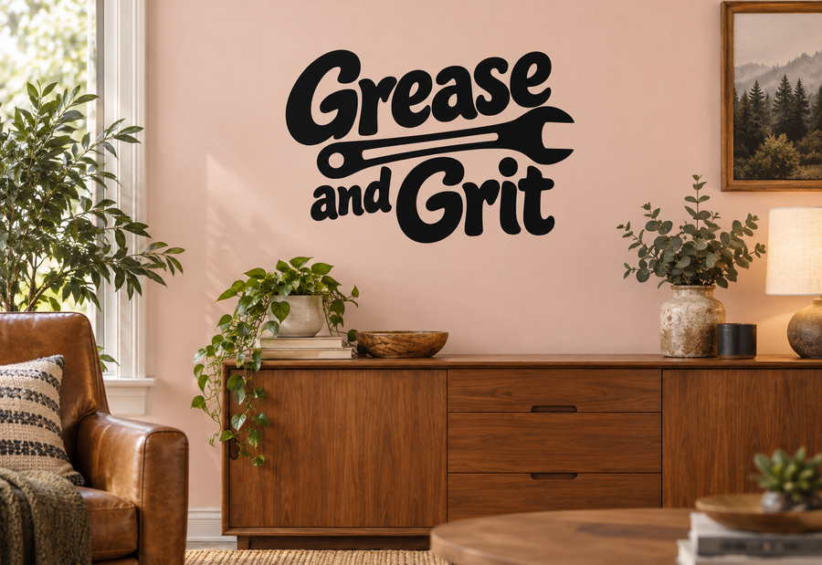 Grease and Grit wall decal with black script lettering on a light wall