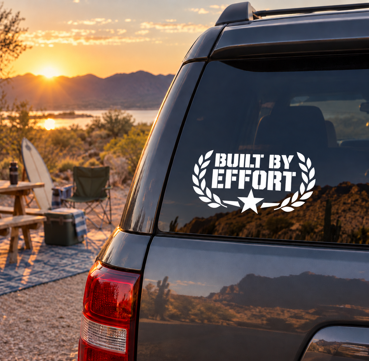 Car vinyl decal with white “BUILT BY EFFORT” text, laurel wreath, and star