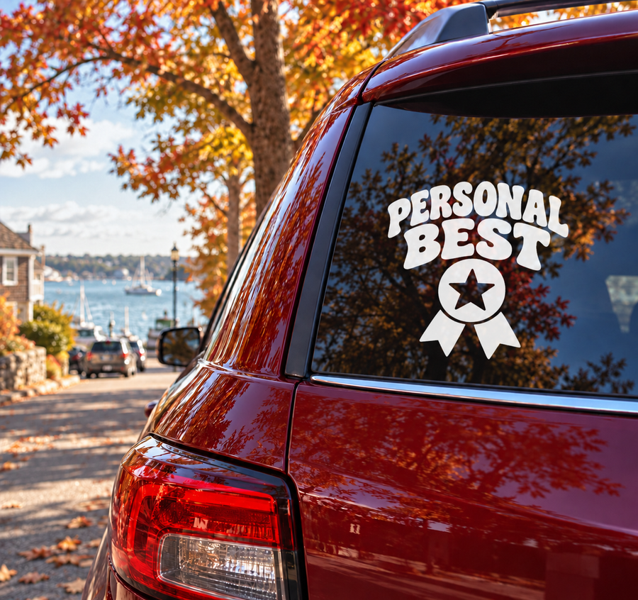 Vinyl car decal with bold "Personal Best" lettering and star-and-ribbon badge