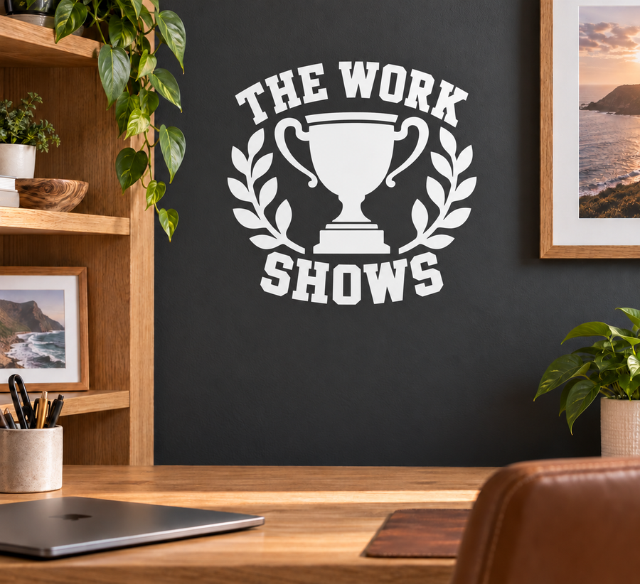 Vinyl decal with trophy and laurel reading "THE WORK SHOWS" in white