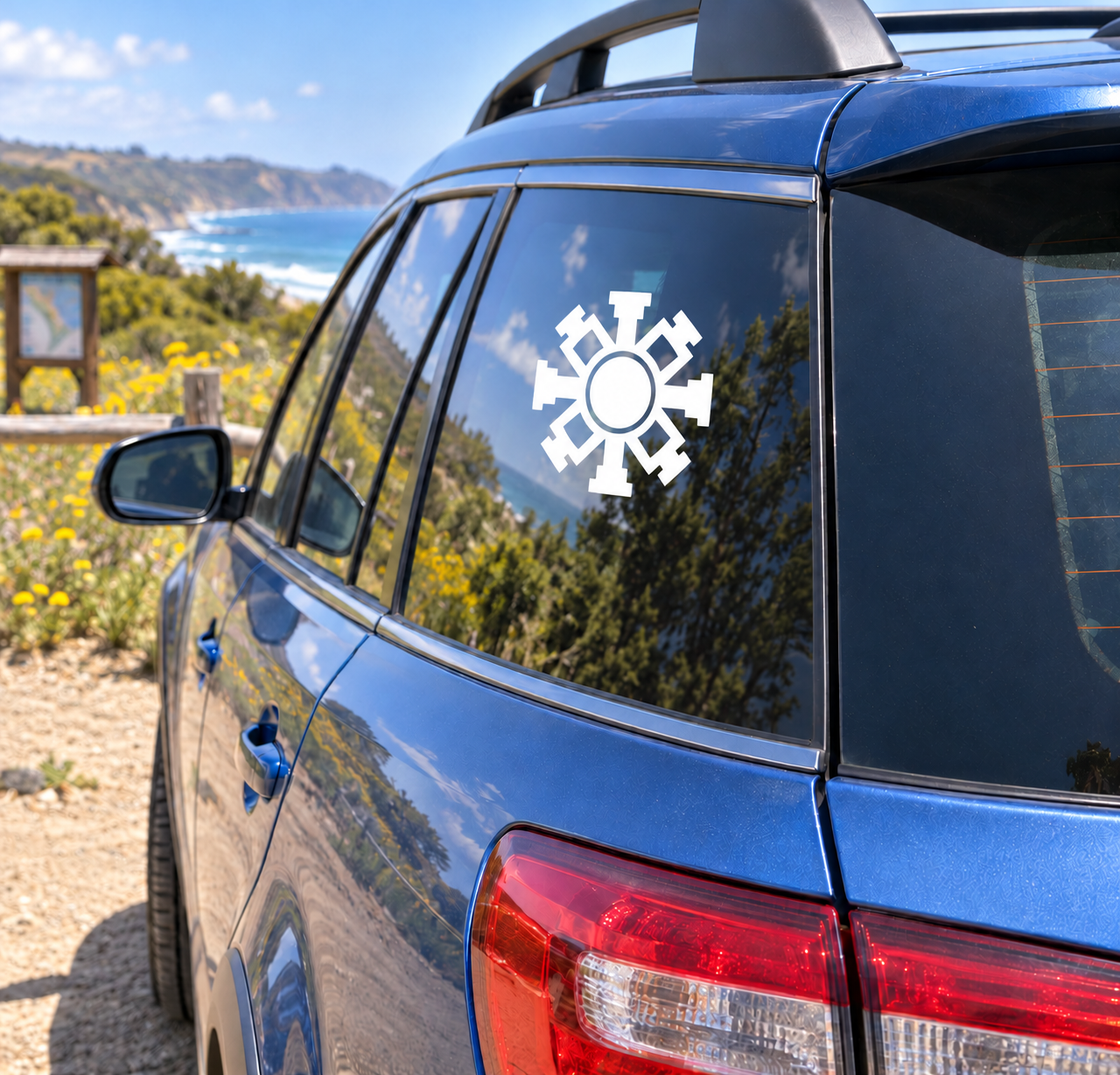 Sunrise Shield vinyl decal with white gear-sun emblem for car windows