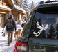 Black longtail bird vinyl decal on dark car rear window