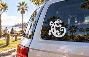 Vinyl lizard stone decal, black and white gecko-like graphic on car window