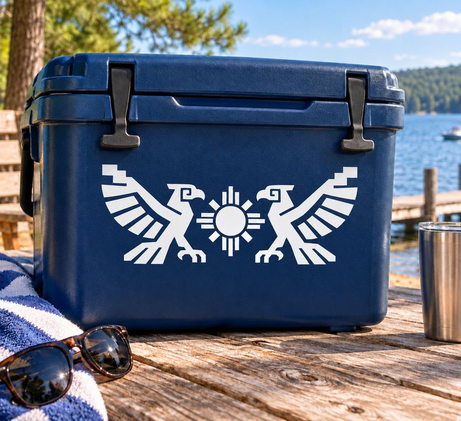 White paired birds vinyl decal with aztec-style sun and wings on blue surface