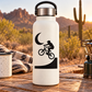 Black crescent moon and BMX rider silhouette vinyl decal with swoosh banner design