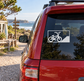 BMX brick bank vinyl decal on car window, black and white bicycle graphic