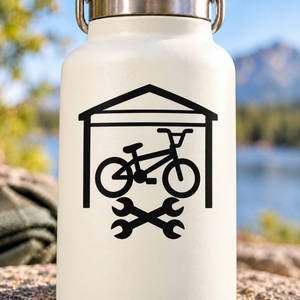 Black BMX garage vinyl decal with bike under shelter and crossed wrench shapes