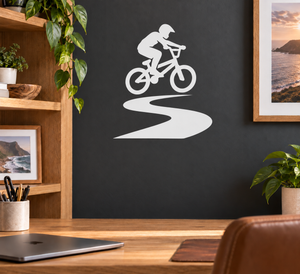BMX track ribbon vinyl decal with bike rider silhouette, white on dark surface
