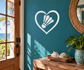 Heart-shaped vinyl decal with badminton racket and shuttle icon