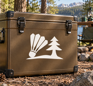 White vinyl decal graphic: shuttlecock, pine trees, and mountain horizon scene.