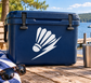 Shuttlecock lightning vinyl decal, white graphic on blue surface
