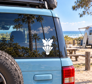 White badminton butterfly crest vinyl decal on car window: butterfly, shuttlecock, crown