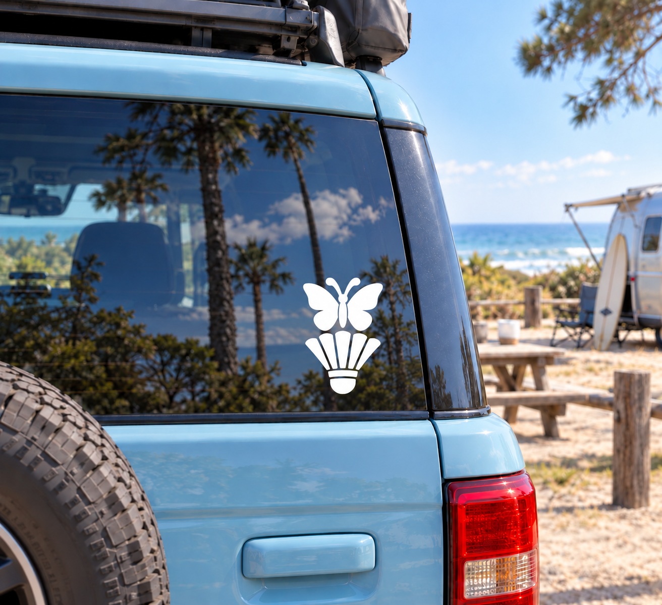 White badminton butterfly crest vinyl decal on car window: butterfly, shuttlecock, crown