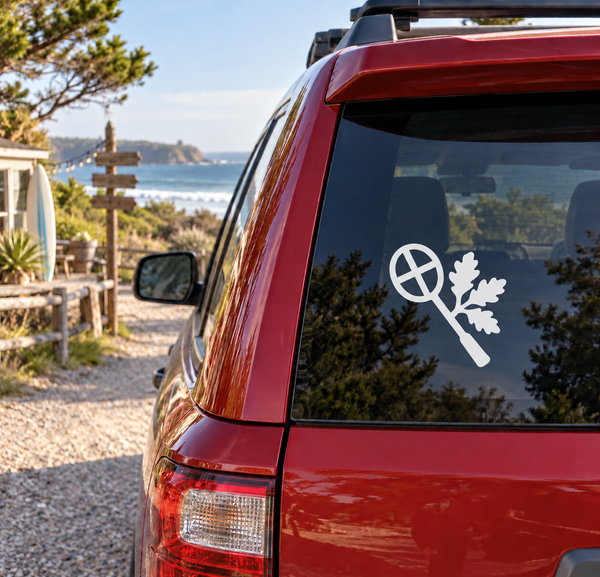 Badminton racket and oak sprig vinyl decal on car rear window, white graphic