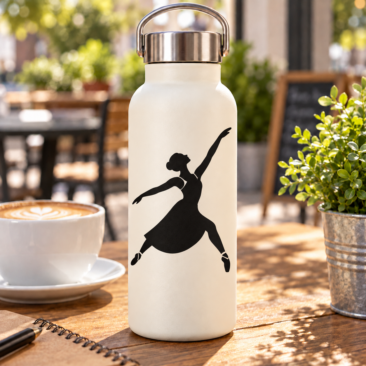 Ballet reaching leap vinyl decal of a black dancer silhouette on a light bottle