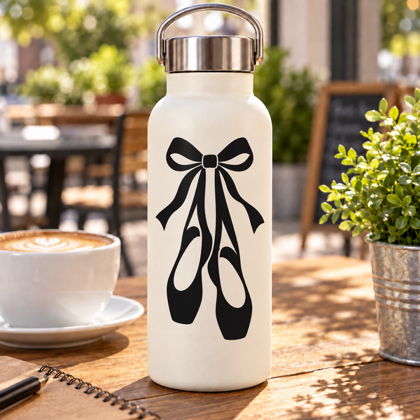 Ballet ribbon vinyl decal pair on white bottle, black bow and ballet shoe shapes