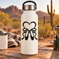 Black heart ballet shoes vinyl decal on a white water bottle