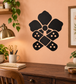 Black bandage-style flower vinyl decal with circular center and dotted bandage pads