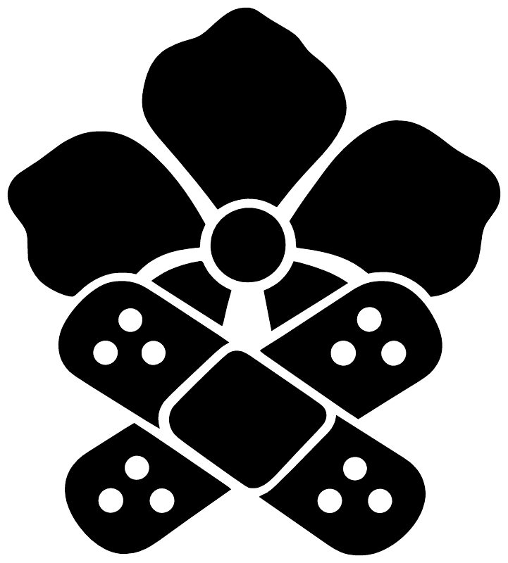 Black bandage-style flower vinyl decal close-up: dotted bandage pads with center circle