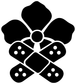 Black bandage-style flower vinyl decal close-up: dotted bandage pads with center circle