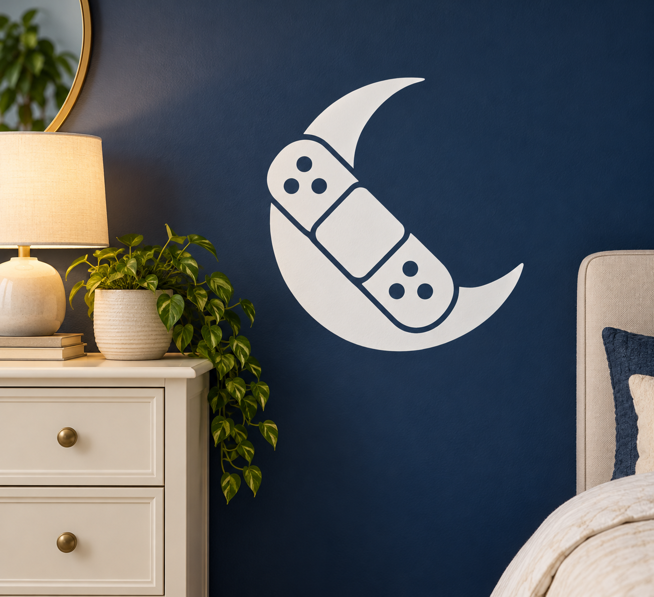White crescent moon vinyl decal with bandaged cartoon face and three dot details