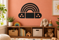 Rainbow arches vinyl decal on black boombox with circular speaker details