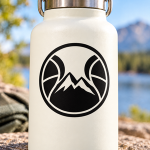 Vinyl decal graphic: black circular halo with basketball wings and mountain peak
