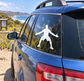 Basketball player silhouette vinyl decal on car window, white outline figure