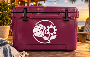 White basketball and sunflower crest vinyl decal on dark purple surface