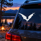 White bat vinyl decal with star trail on car rear window