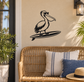Pelican surfboard vinyl decal, black silhouette on wall