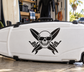 Skull vinyl decal with sunglasses and crossed swords on a white car hood
