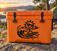 Surfing sun vinyl decal on orange cooler, black cartoon sun surfer riding wave lines