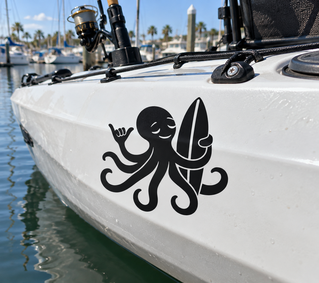 White boat hull with black octopus vinyl decal near a corner