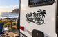 Vinyl decal with bold “High Tides Good Vibes” text and palm tree silhouette