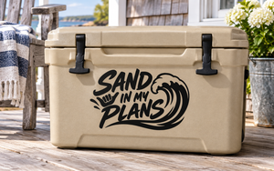 Black wave text vinyl decal, 'Sand in My Plans' on tan cooler
