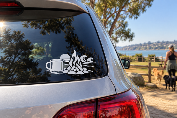 Black campfire coffee vinyl decal on car rear window, cup and flames design