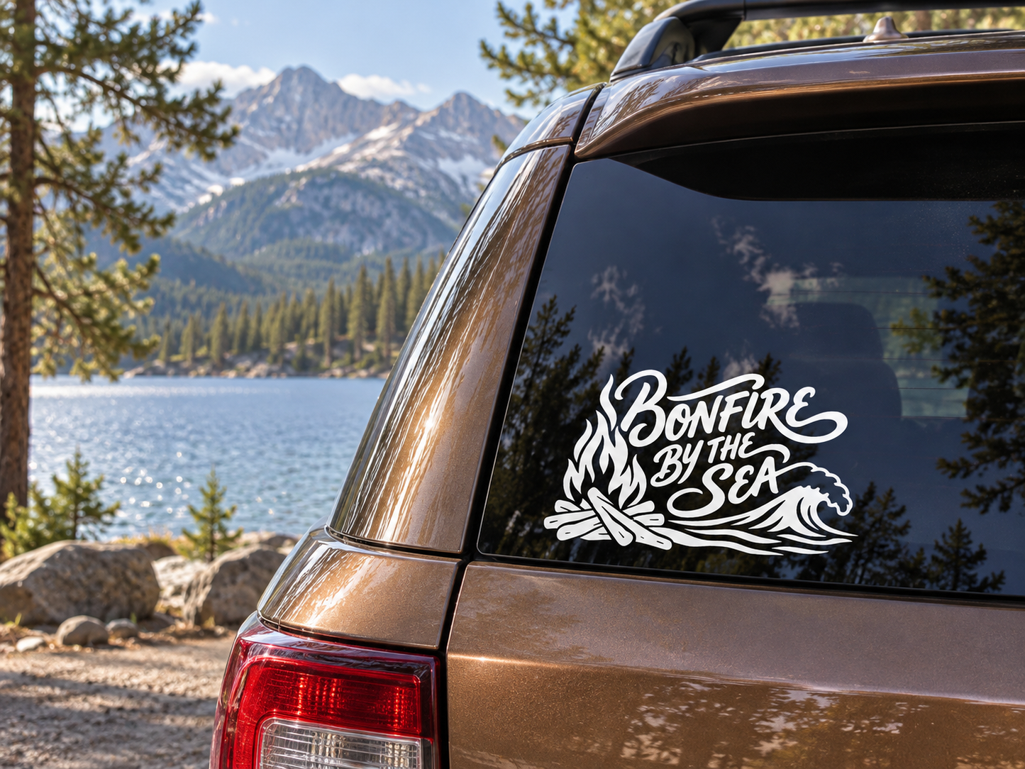 Vinyl decal on car window: Bonfire By The Sea logo with flames and waves