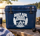 Navy vinyl decal: white 'SALT AIR WARM EMBERS' text with campfire graphic