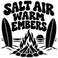 Black vinyl decal on white with 'SALT AIR WARM EMBERS' text, flames, and rocks