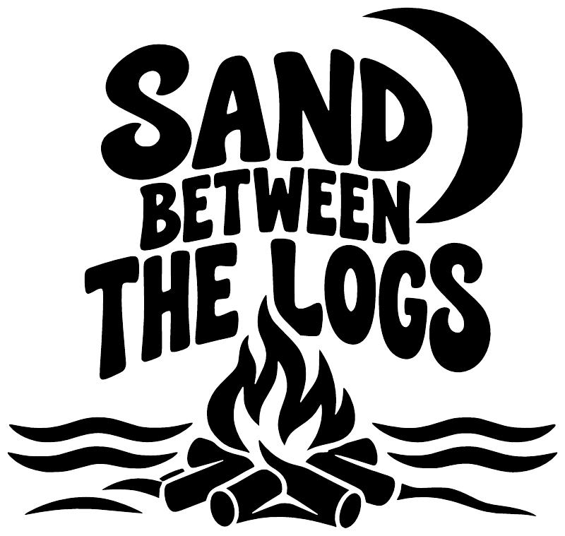 Vinyl decal closeup: black “Sand Between the Logs” lettering with flame and logs