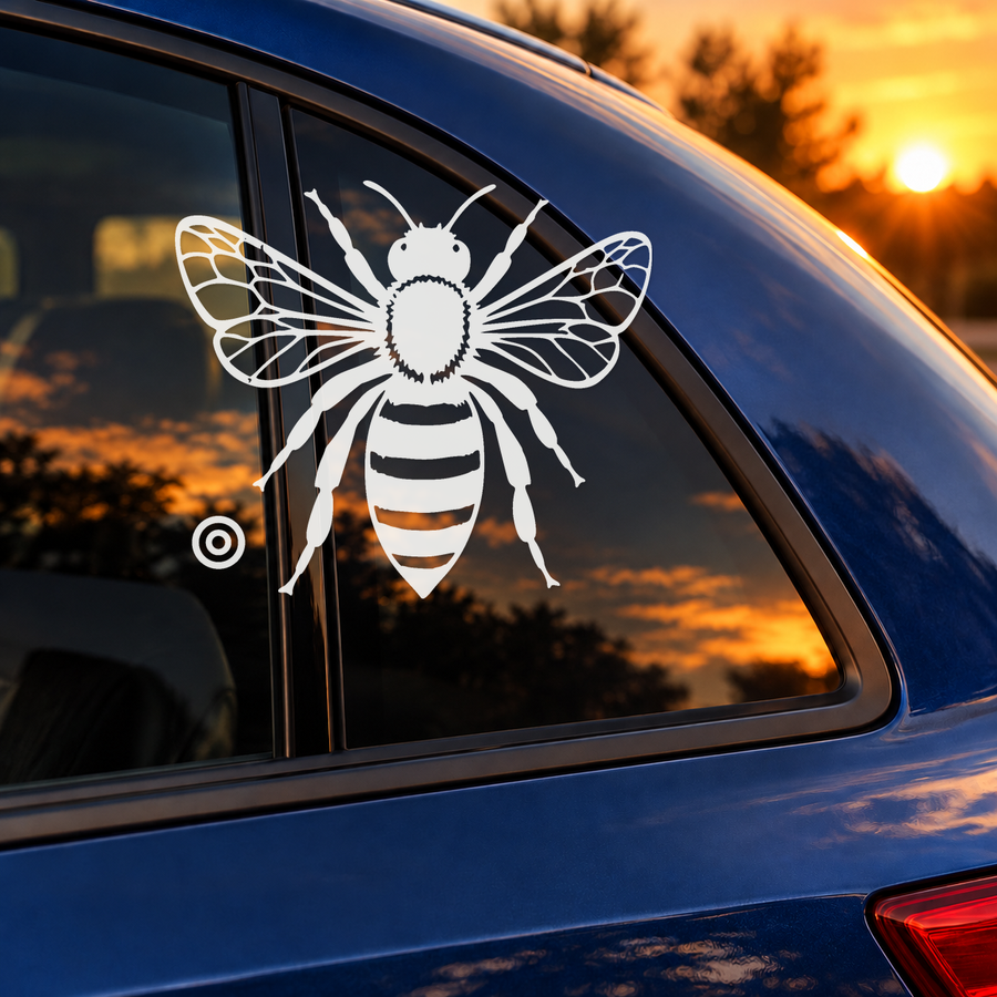 Mirrored honey bee vinyl decal with double orbit rings on car window