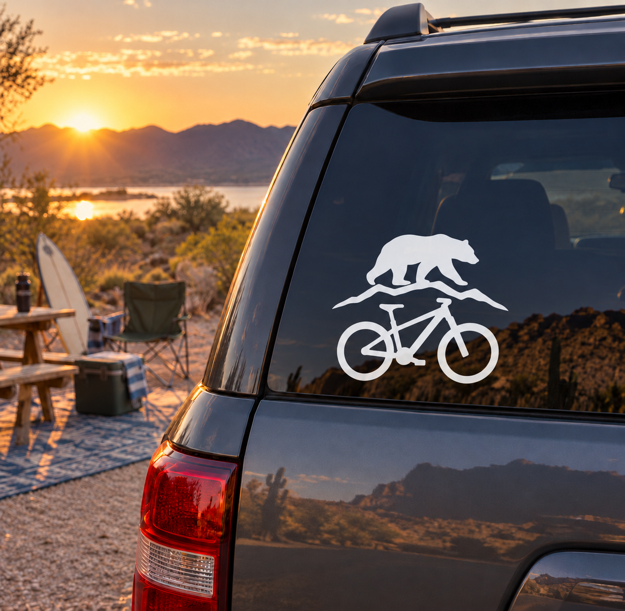 White bicycle bear trail vinyl decal on car rear window glass