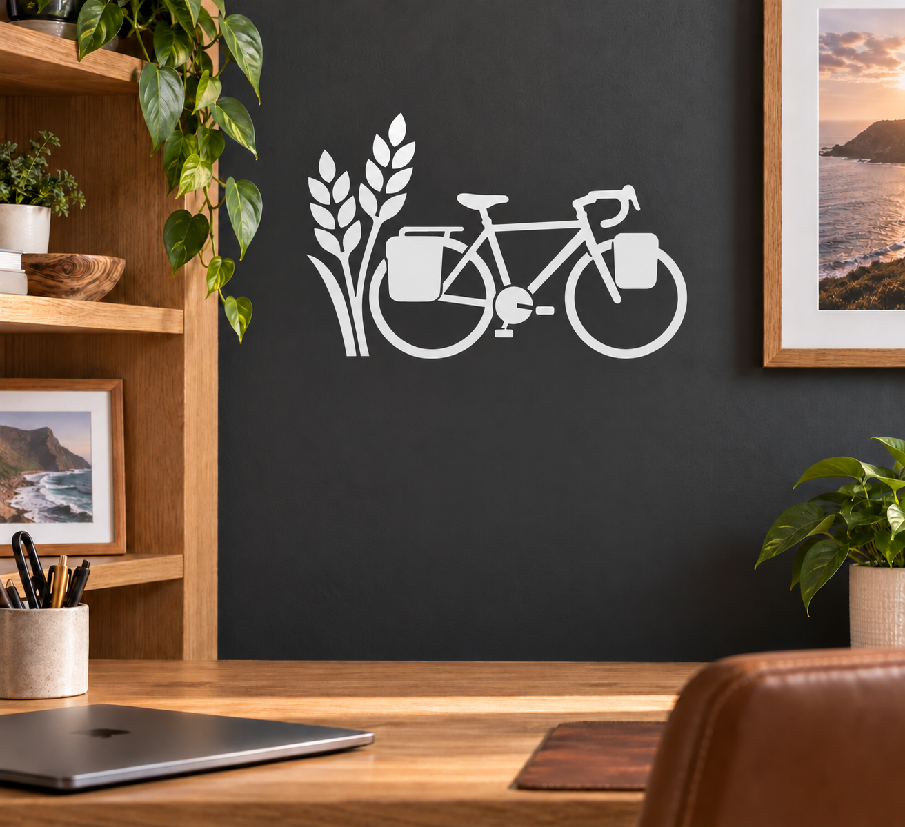White vinyl bicycle decal with wheat emblem and bicycle silhouette on a wall