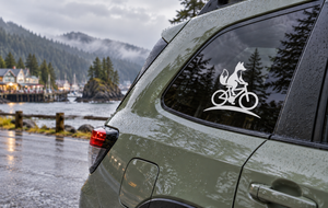 Bicycle fox riding vinyl decal on car window, white icon with bicycle and fox