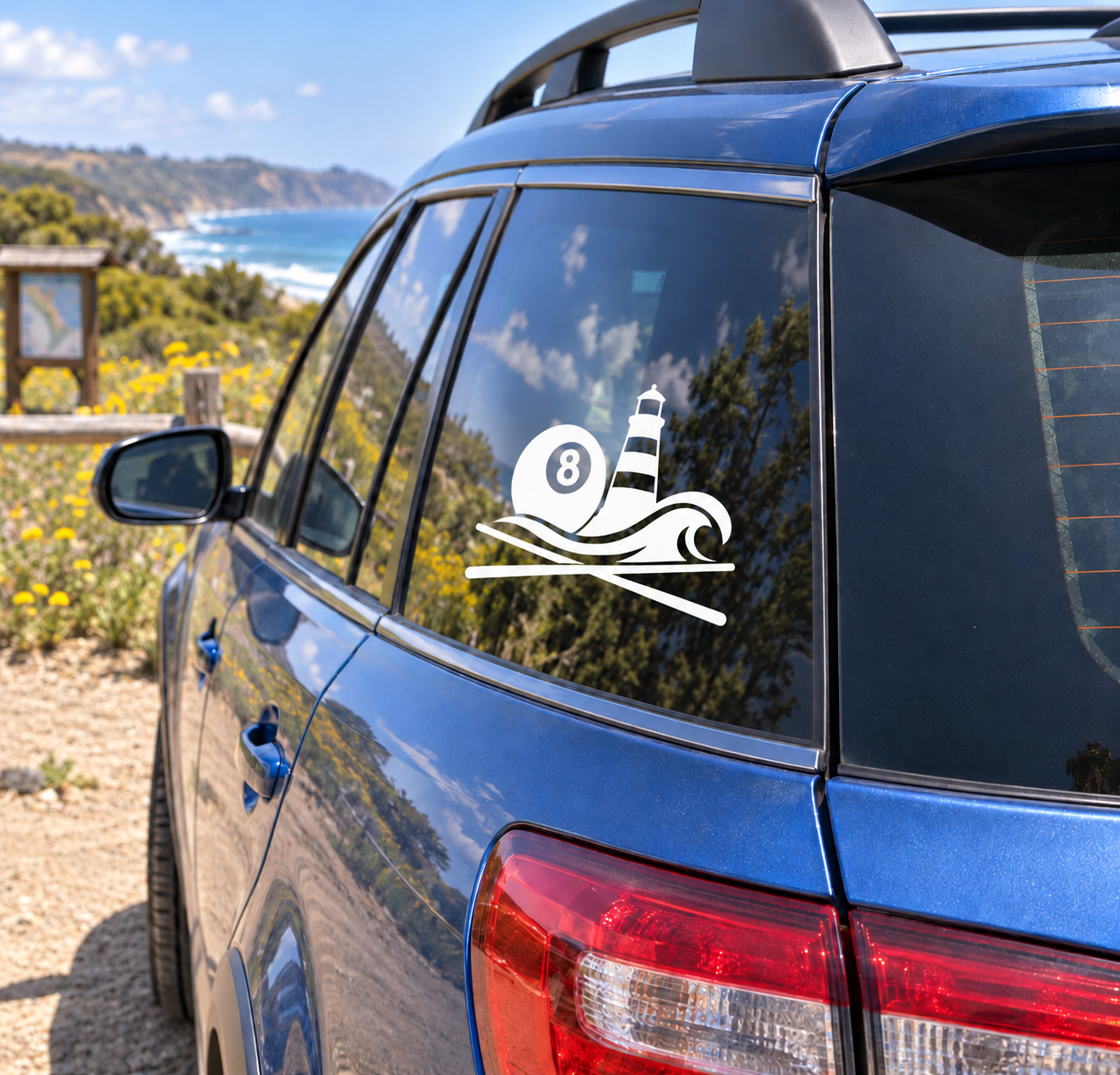 Vinyl decal of lighthouse, 8 ball, and waves on a car rear window
