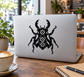 Clockwork beetle vinyl decal with black gear-driven insect design