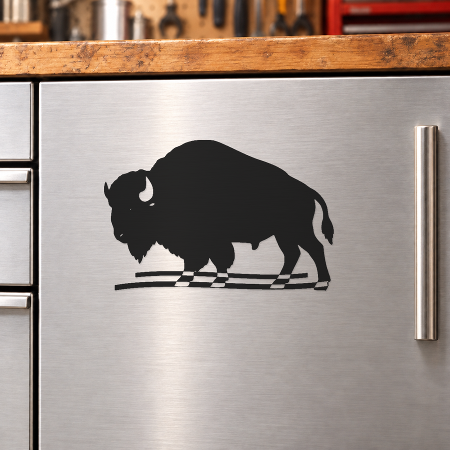 Bison silhouette metal plaque with shaggy beard, twin wind swooshes, and checkered base