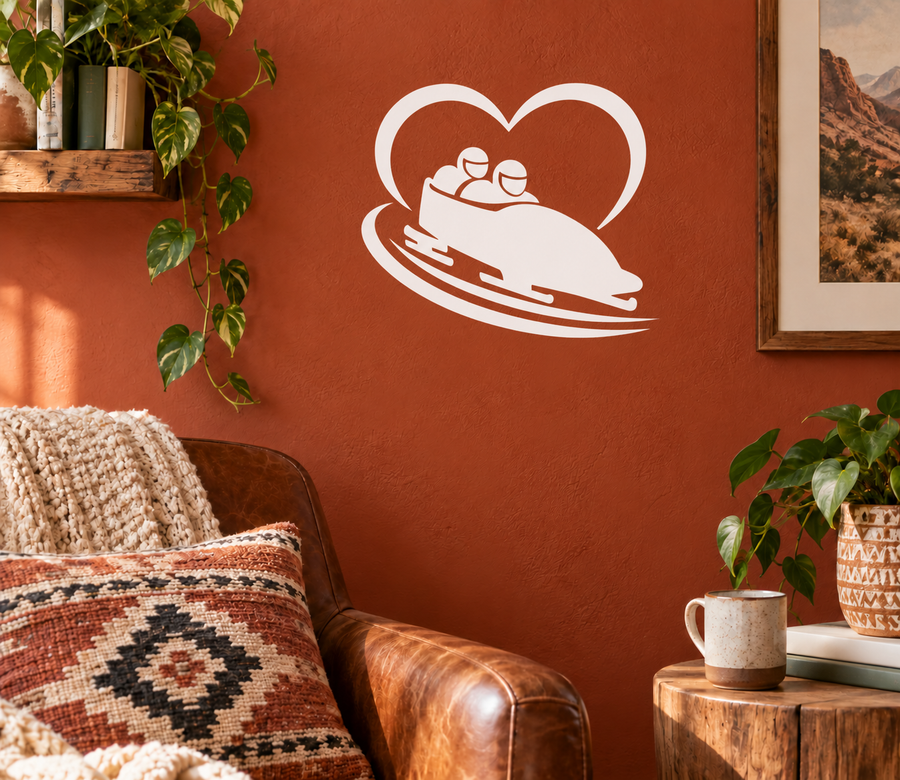 Heart-shaped bobsled vinyl decal, white outline with sled and two riders