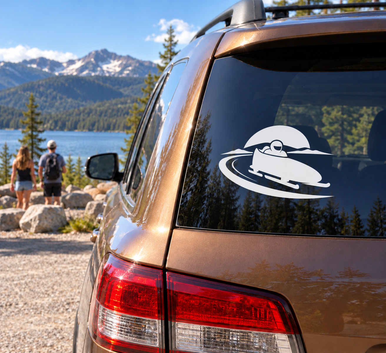 Bobsled vinyl decal sticker on car rear window with white sled and driver graphic